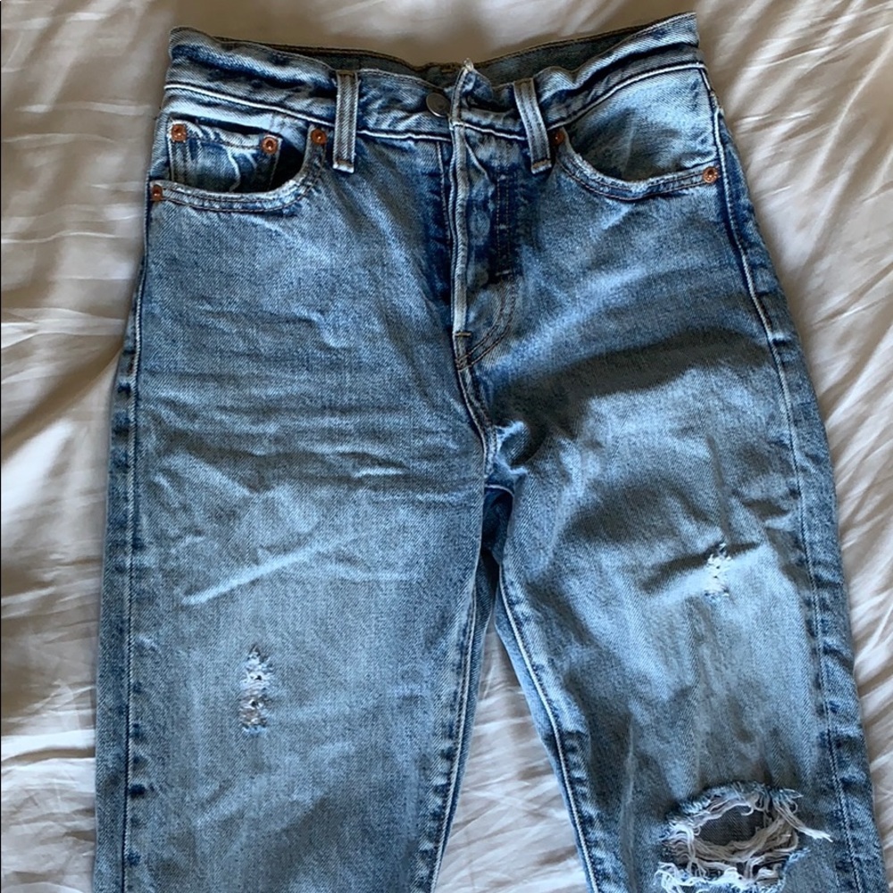 Levi jeans with holes size 24